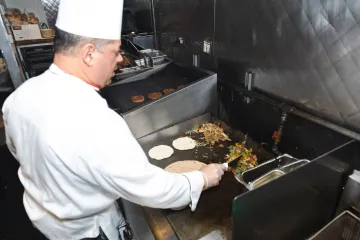 Chef Mike prepares Beyond Steak on the grill