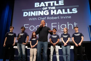 The panel of judges on stage