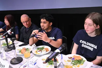 Student judge speaks into micophone