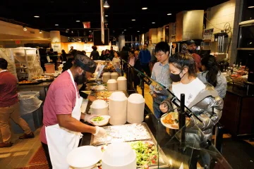 Ferris staff member serving students