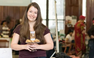 Janie holding pecan pie cookies