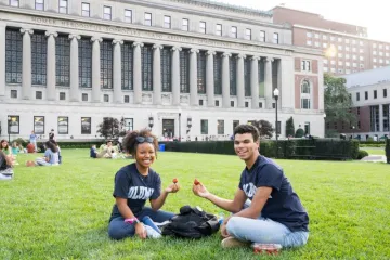Students sitting on the lawn