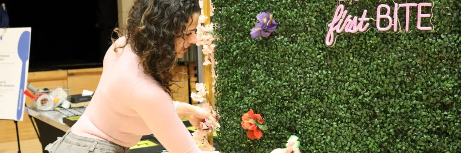 Mel adds finishing touches to the decorations