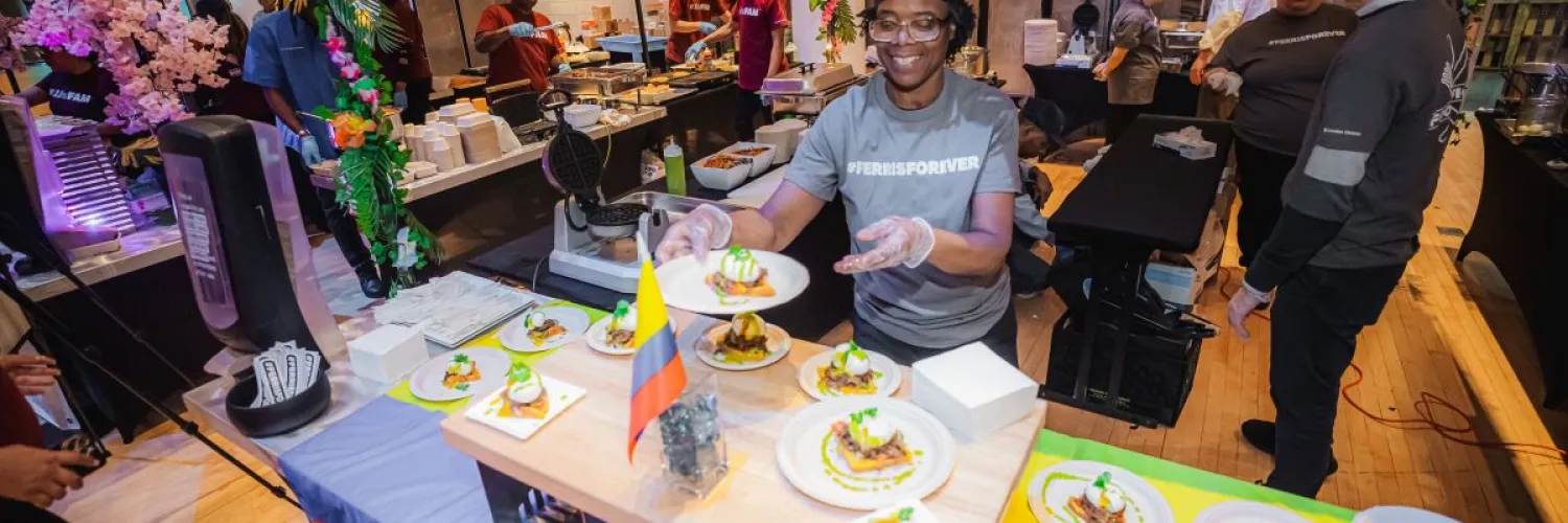 A Ferris staff member arranges food