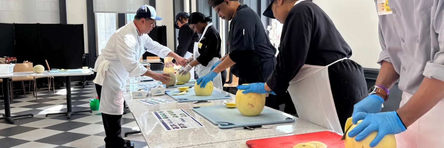 Chef Mike reviews knife skills with Dining staff in John Jay