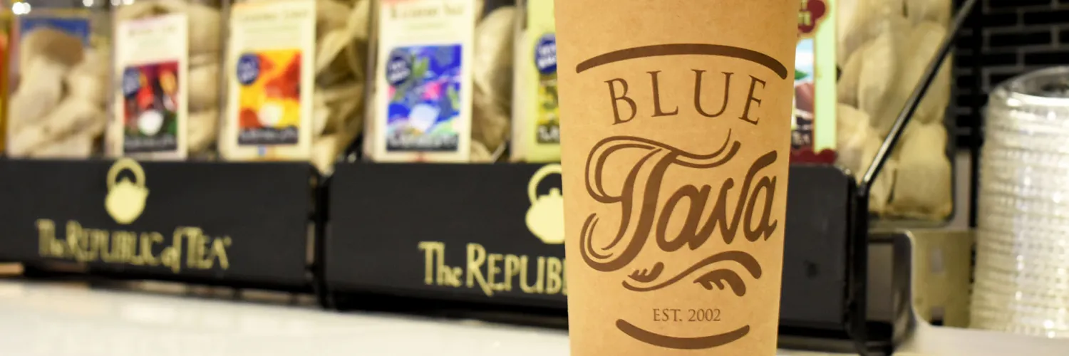 Blue Java Coffee Cup in front of Republic of Tea Stand