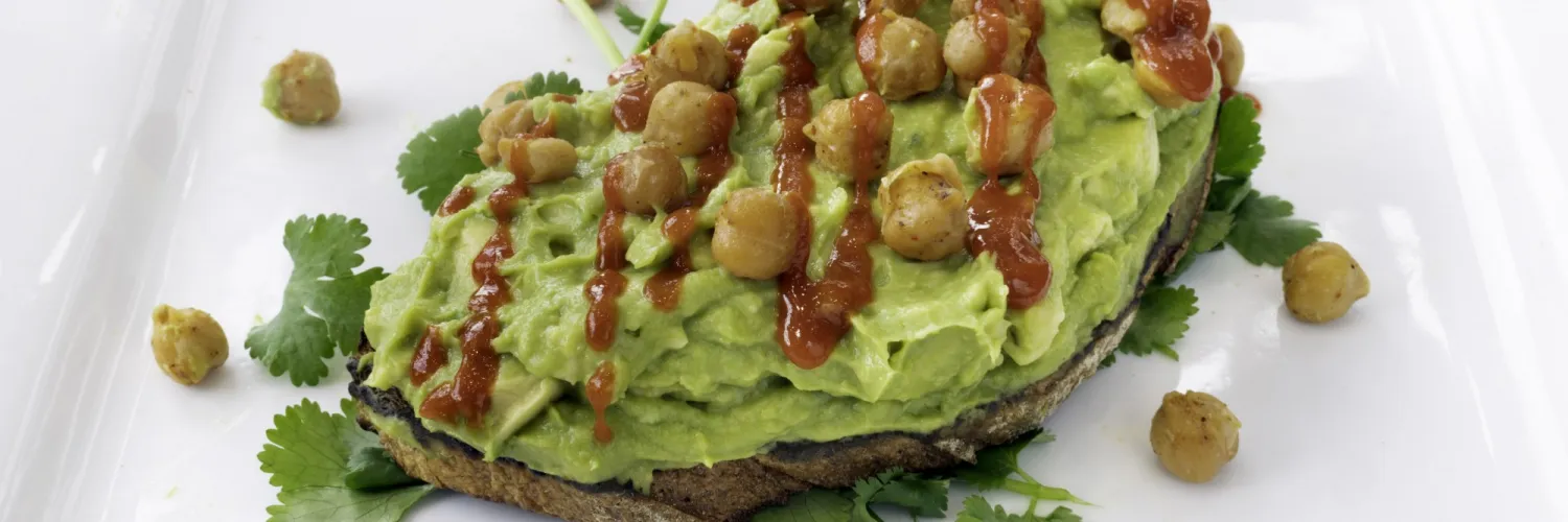 Avocado Toast with Chickpeas and Hot Sauce on Top